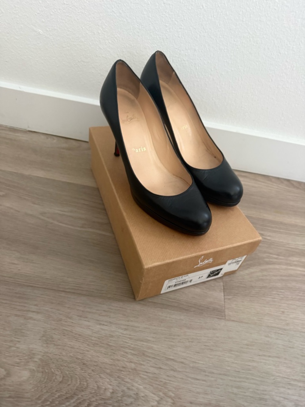 Christian Louboutin Black Leather Pumps with Red Sole Accent